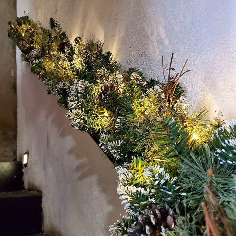 9 FT Prelit Christmas Garland With Pine Cones Artificial Snowy Pine Garland For Christmas 50 LED Battery Operated Warm Lights And Timer Xmas Garlands